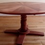 Bespoke round wooden table side view